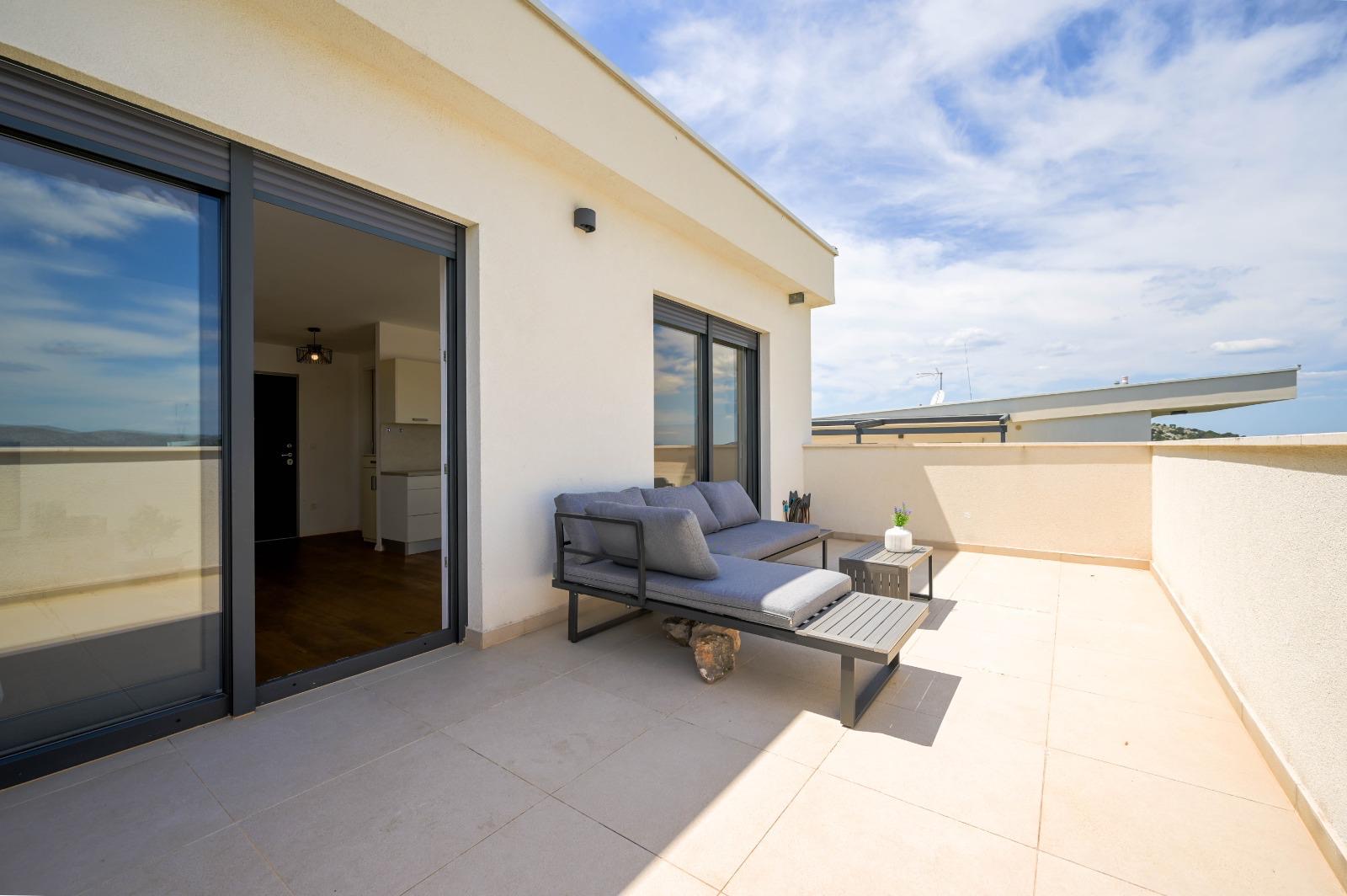 Corner sofa on the sea-view terrace