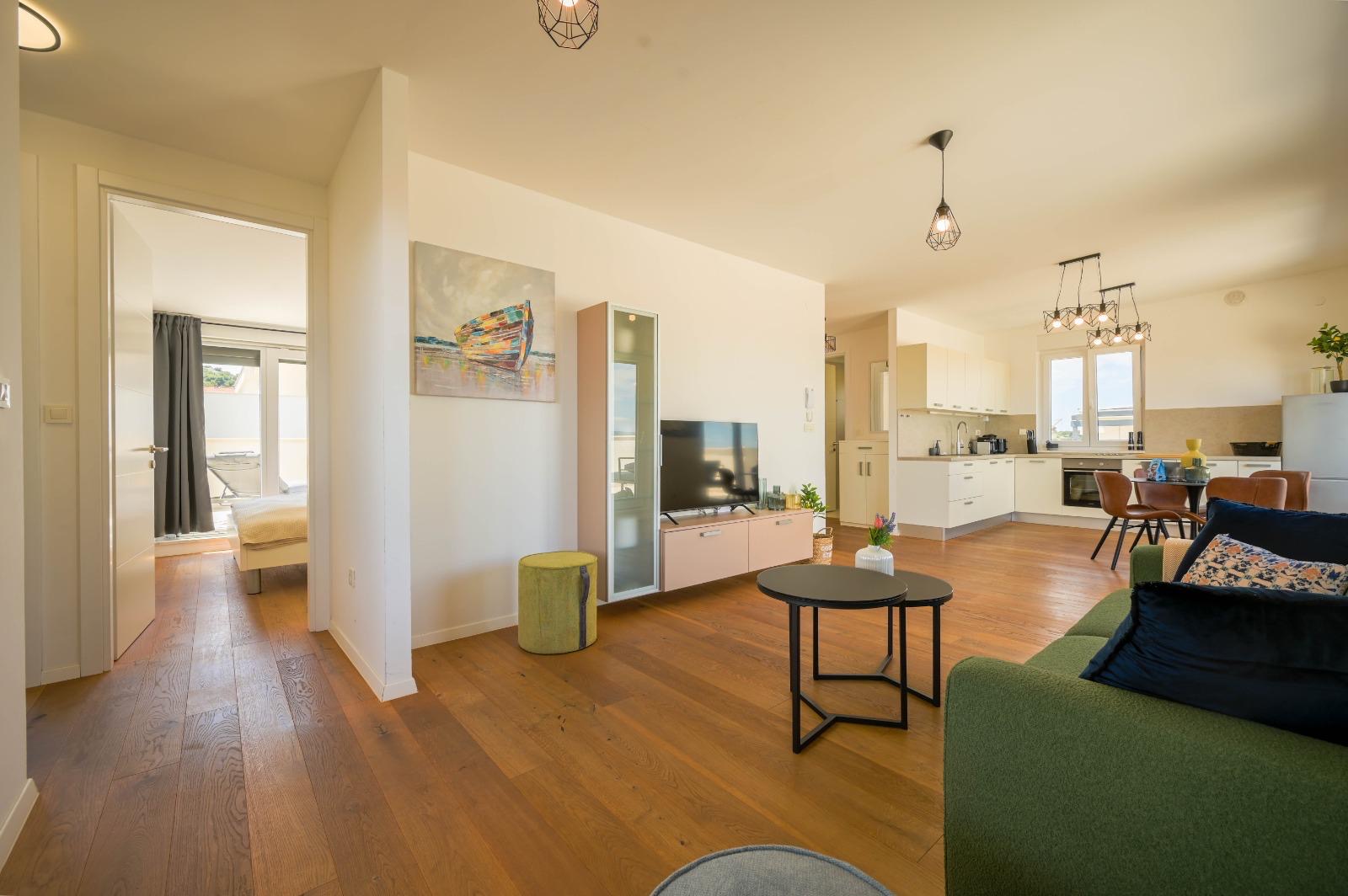 Open plan with hallway to bedrooms