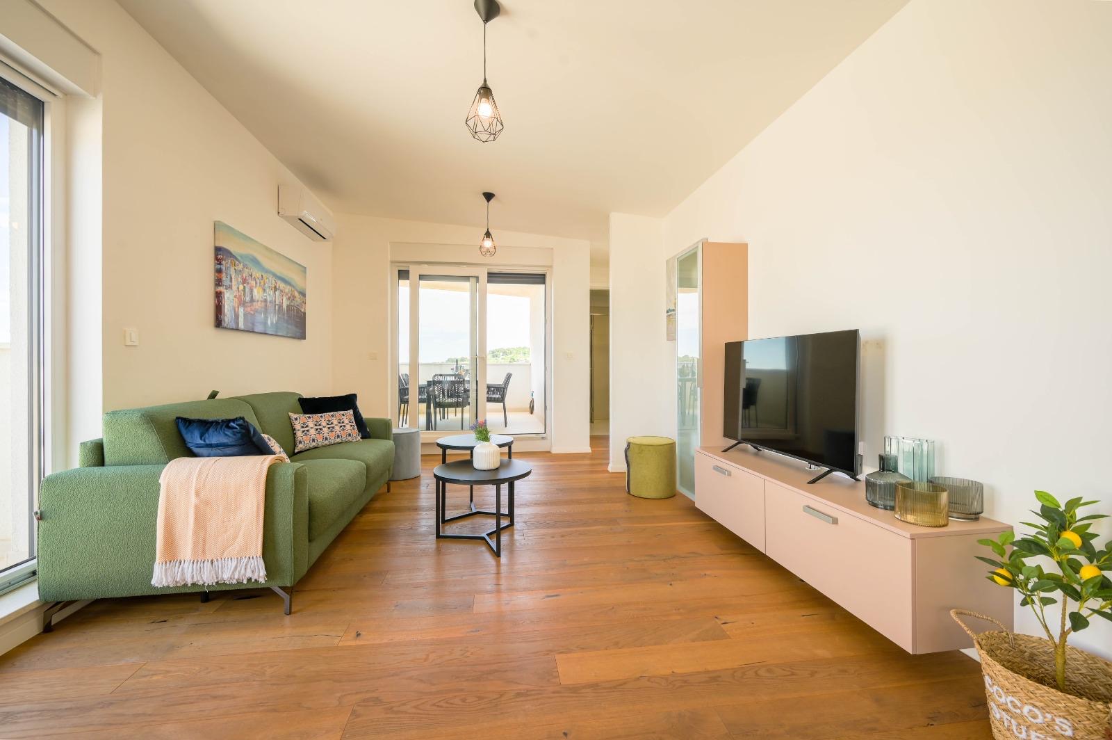 Living room with TV and lemon tree