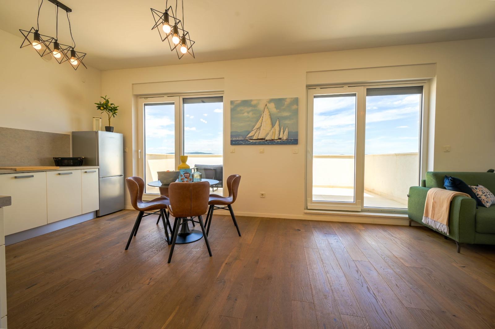 Dining and living area with sea view